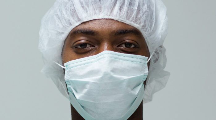 Male doctor wearing a mask