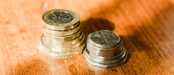 piles of coins on a table